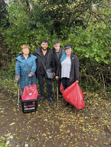 Alex with the litter picking team